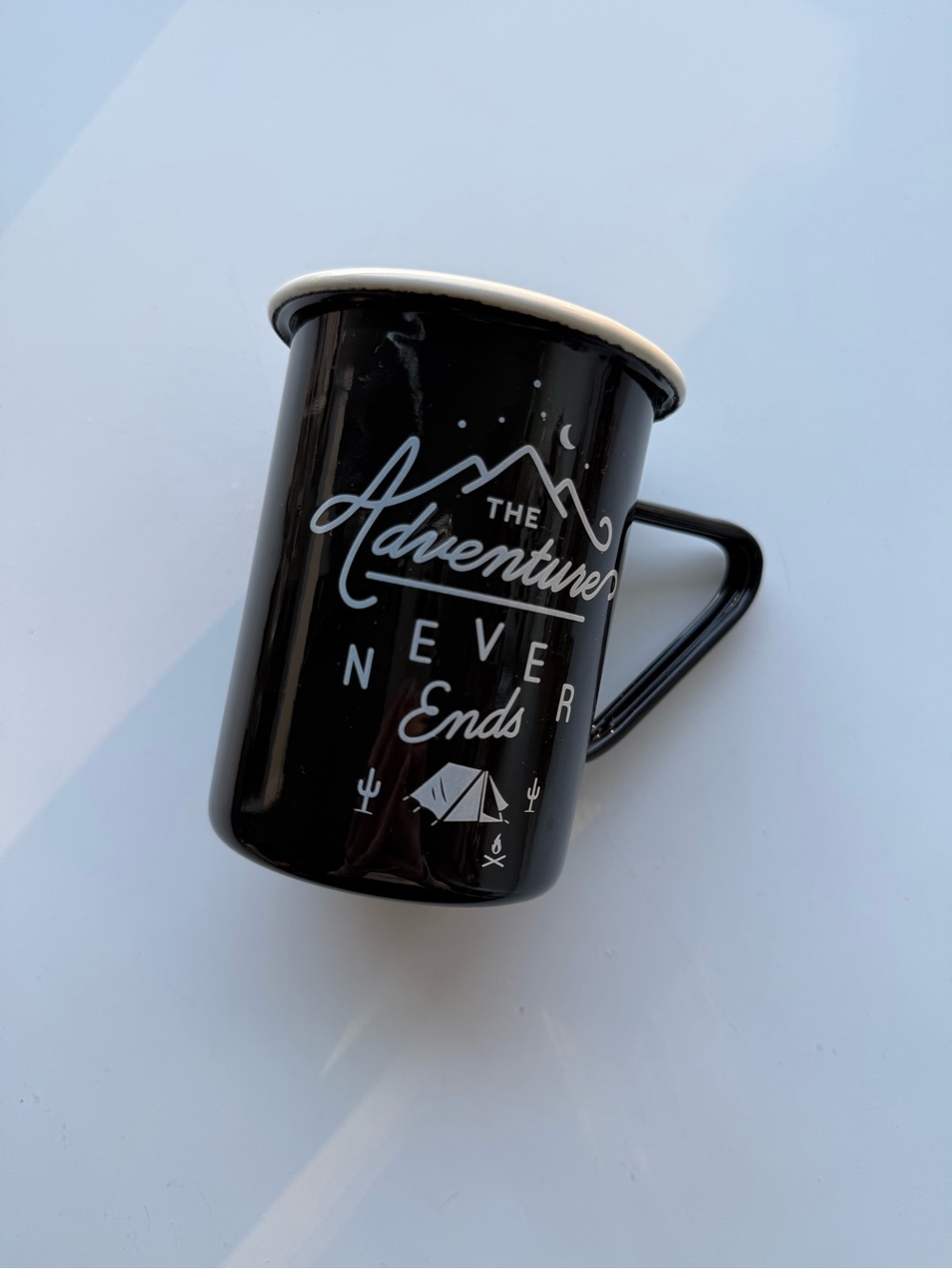 Black Enamel Camping Mug - "The Adventure Never Ends"